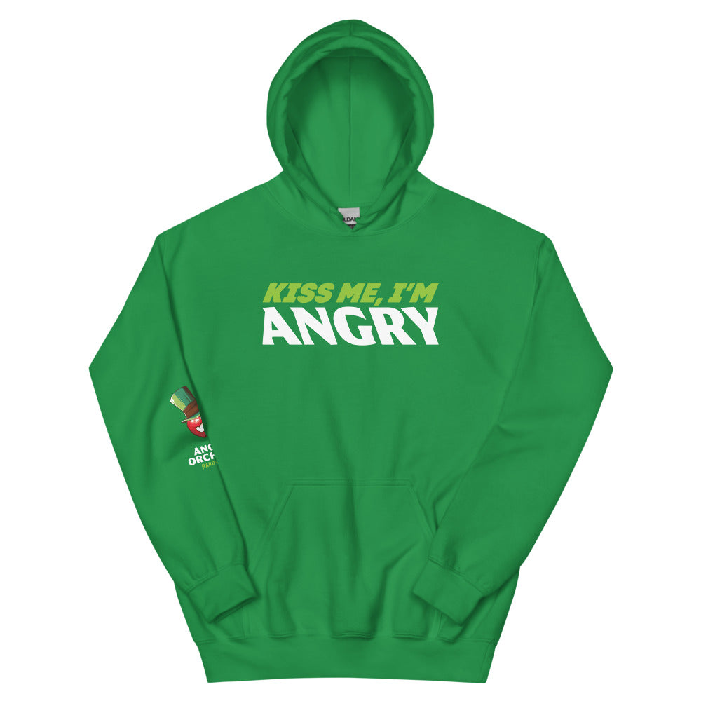 Kiss Me, I'm Angry hoodie in Shamrock Green. First line of text reads "Kiss me I'm" in lime green. Bottom line reads "ANGRY" in larger white text. The logo is on the front and centered on the hoodie. Right sleeve features a small design featuring a red angry orchard apple with a shamrock-colored top hat. Beneath the design is "Angry Orchard" in white text, followed by "Hard Cider" in smaller lime green text.