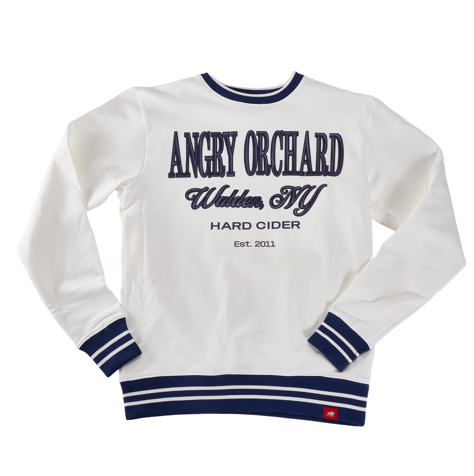 Angry Orchard White Walden Crew Sweatshirt—front view showing navy embroidered text “ANGRY ORCHARD,” “Walden, NY,” “HARD CIDER,” and “Est. 2011,” with ribbed crewneck, cuffs, and hem featuring navy stripe accents; premium hard cider apparel.