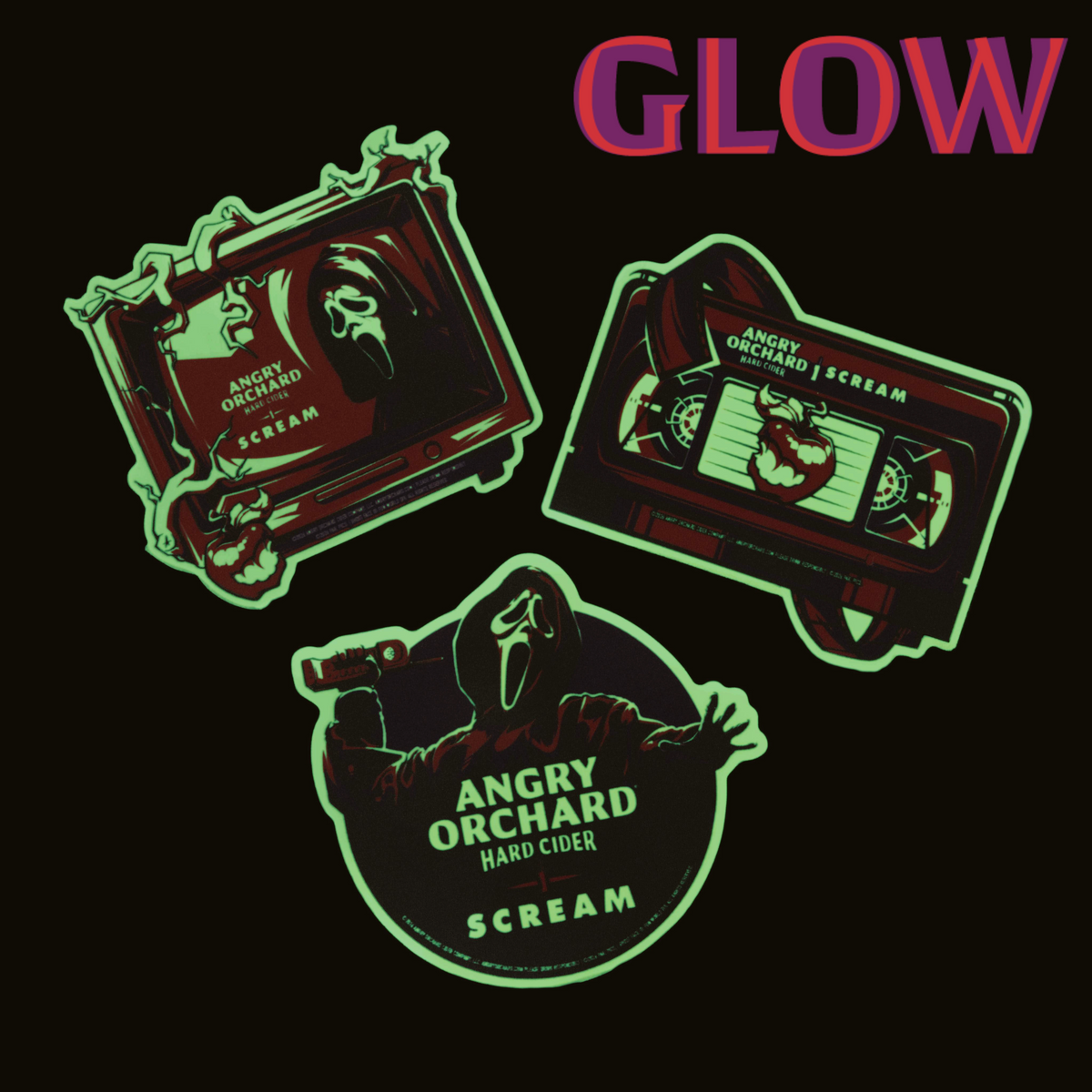 Three stylized Scream-themed stickers on a black background: a framed TV graphic, a cassette tape, and a circular character graphic with the text 'ANGRY ORCHARD HARD CIDER SCREAM.' The word 'GLOW' appears in large pink-to-purple gradient letters at the top right.