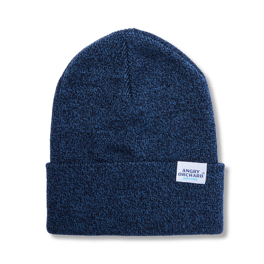 A navy blue heather knit beanie hat with a folded cuff, featuring a small white 'ANGRY ORCHID' brand patch on the side, set against a plain white background.