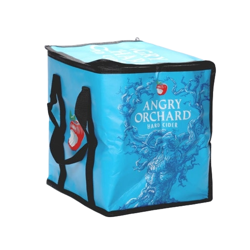 This blue cooler bag includes five sides of designs. Two sides have the iconic Angry Orchard red bitten apple, the other two have writing "Angry Orchard Hard Cider" with an image of the Angry Orchard tree trunk with a face. The top of the cooler says, 'Angry Orchard Hard Cider".